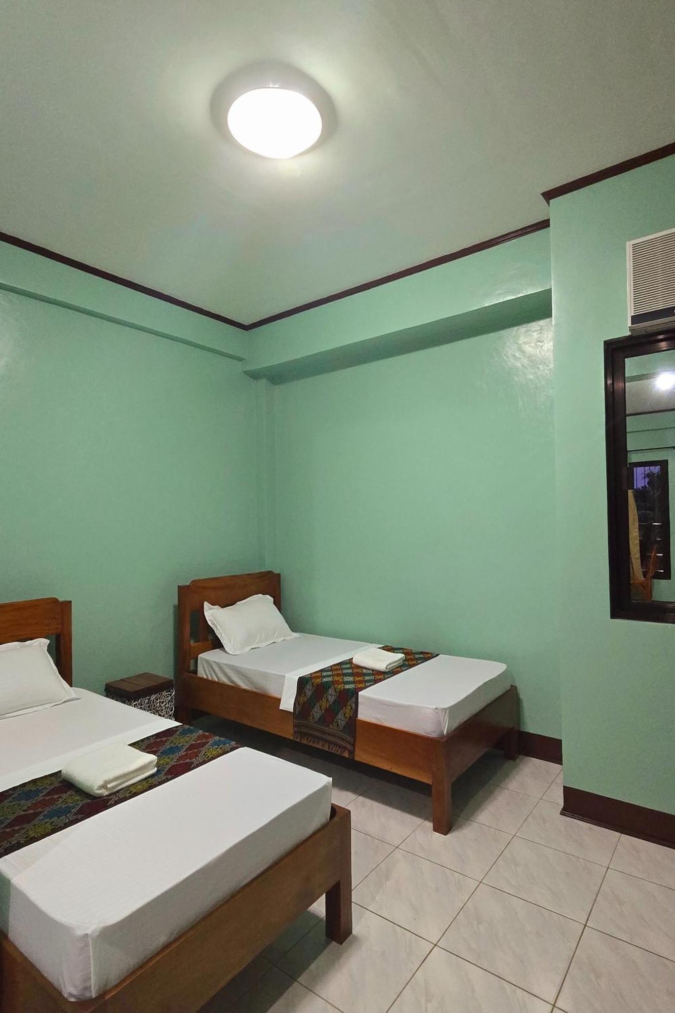 Nober Pension House City Center Puerto Princesa Bagian luar foto